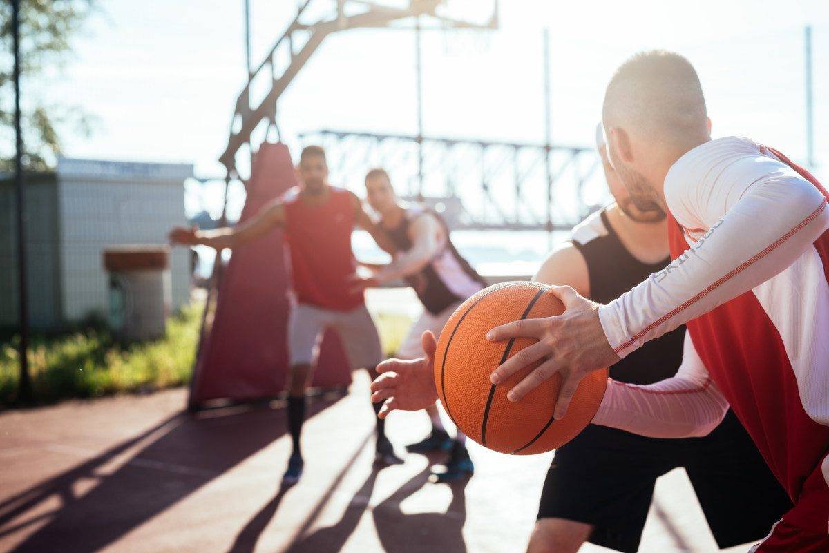 Man passing the ball to another player.